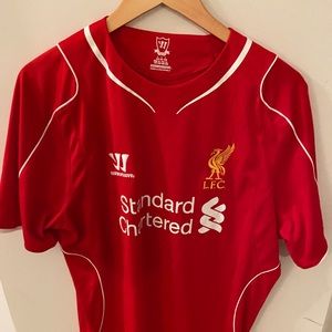 Liverpool Football (soccer) jersey.